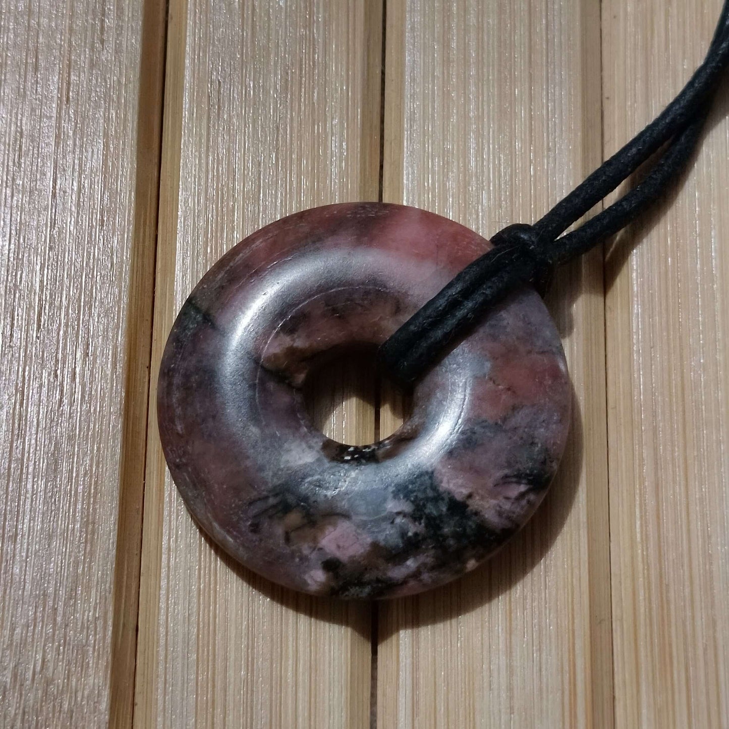 Rhodochrosite Pi Disc Pendant