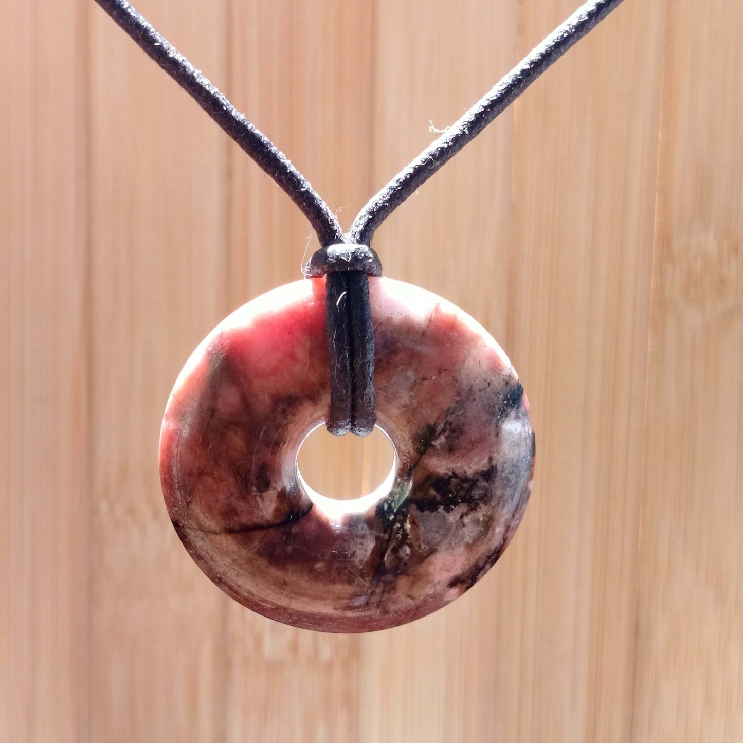 Rhodochrosite Pi Disc Pendant