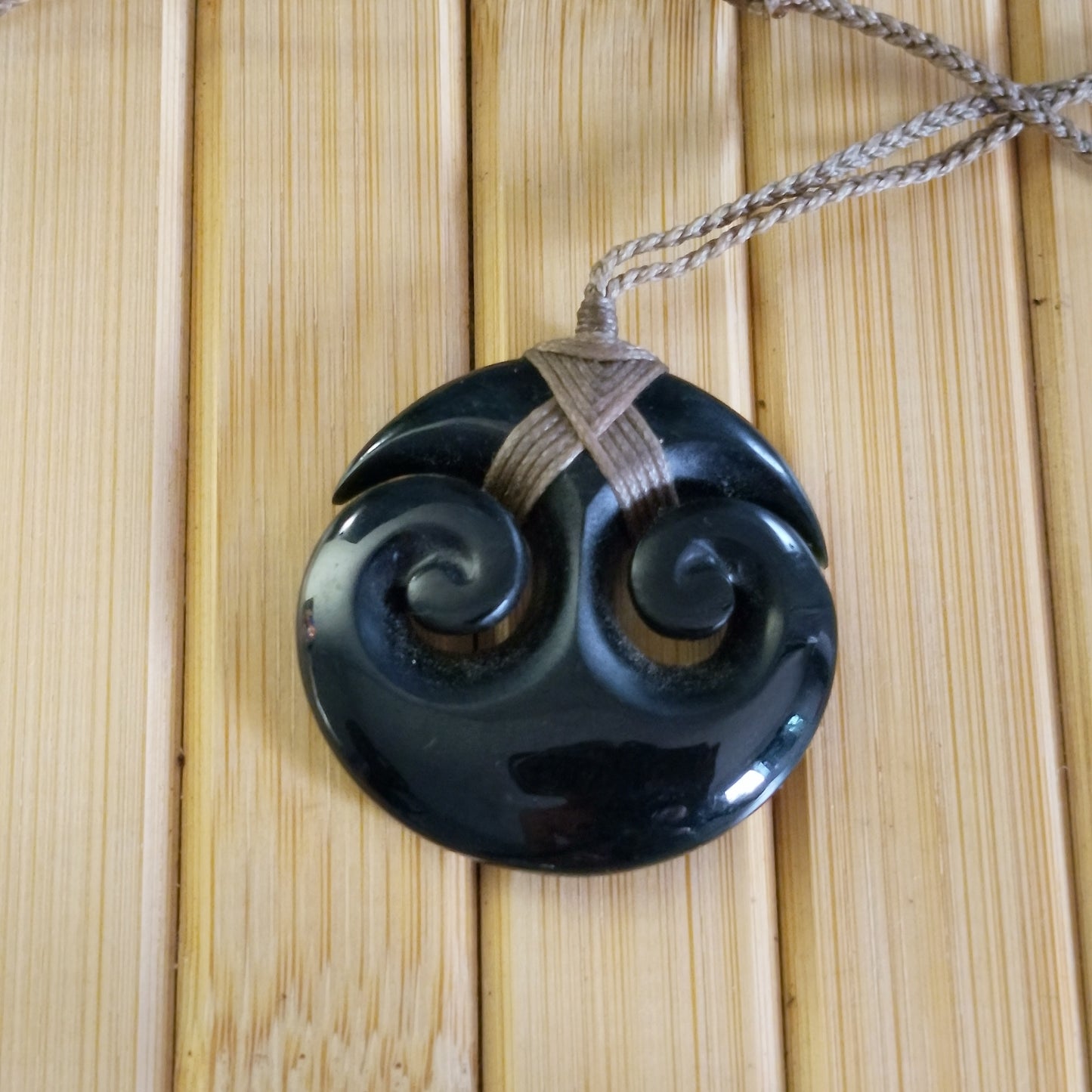 Black Jade Round Double Twirl Pendant on Adjustable Braided Cord