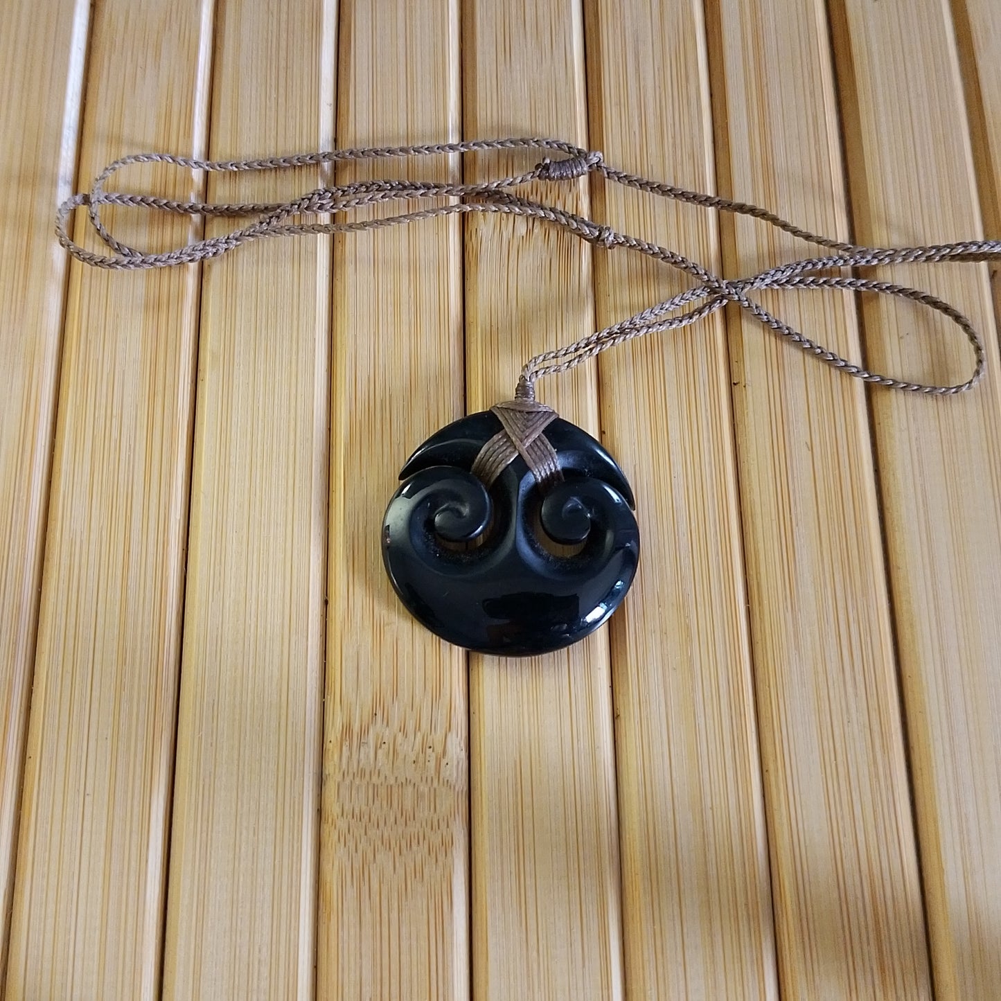 Black Jade Round Double Twirl Pendant on Adjustable Braided Cord